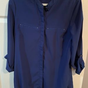 Ricki’s button down blouse. Royal blue, size 8. Slightly worn.